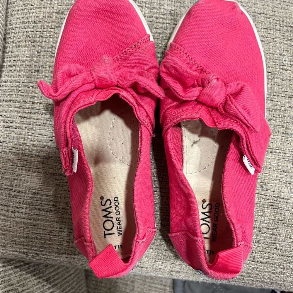 TOMS Pink Canvas Slip-On Shoes with bow